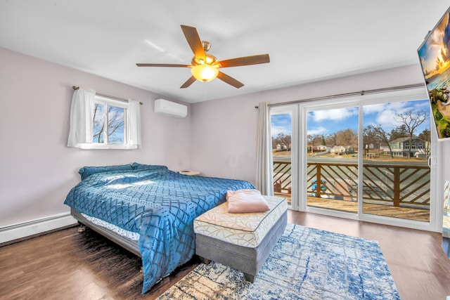 bedroom with access to outside, wood finished floors, a wall mounted air conditioner, and a baseboard radiator