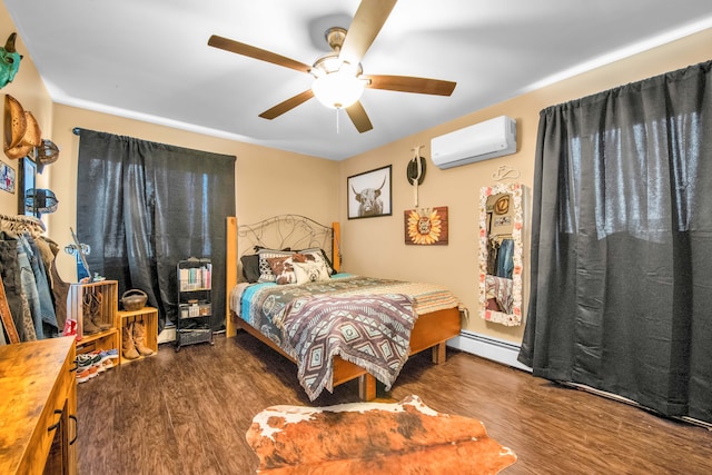 bedroom featuring baseboard heating, a ceiling fan, a wall unit AC, and wood finished floors