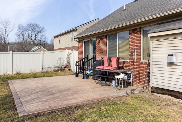 view of patio / terrace with fence