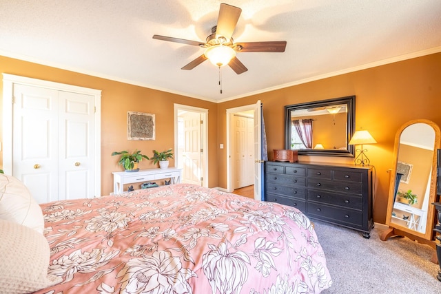 bedroom with a closet, light colored carpet, crown molding, and ceiling fan