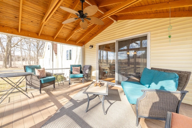 exterior space with an outdoor living space and a ceiling fan