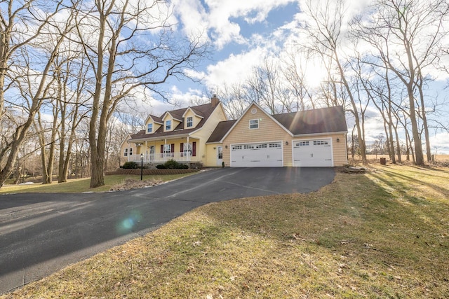 cape cod house with aphalt driveway, a front yard, covered porch, a chimney, and an attached garage