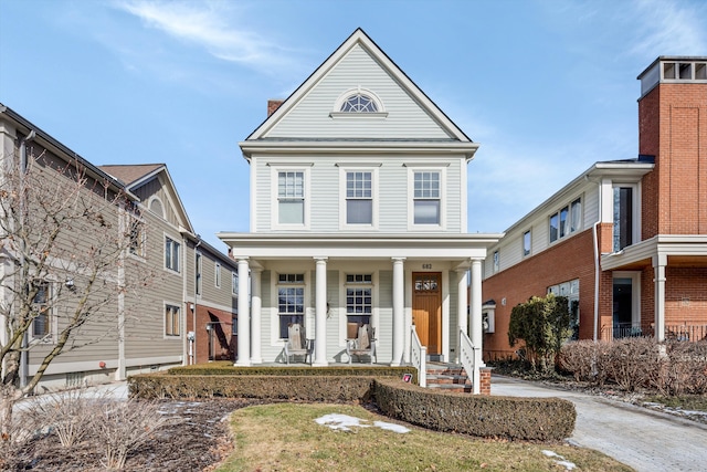 view of front of property featuring covered porch