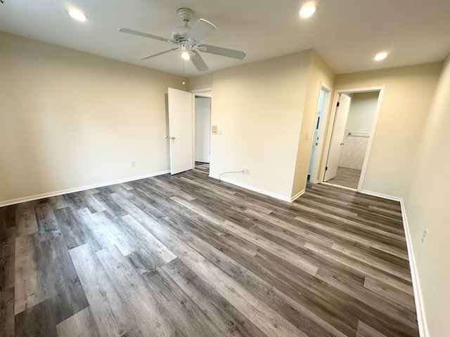 spare room featuring recessed lighting, dark wood-type flooring, baseboards, and ceiling fan