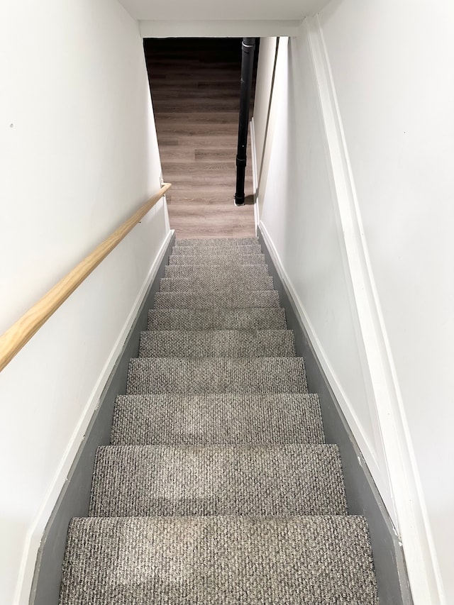 stairway with baseboards