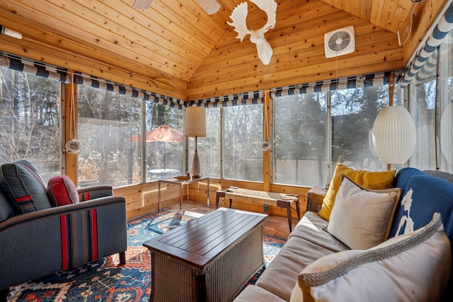 sunroom / solarium with visible vents, wood ceiling, a ceiling fan, and vaulted ceiling