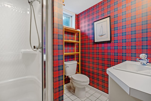 bathroom with tile patterned flooring, a shower stall, wallpapered walls, toilet, and vanity