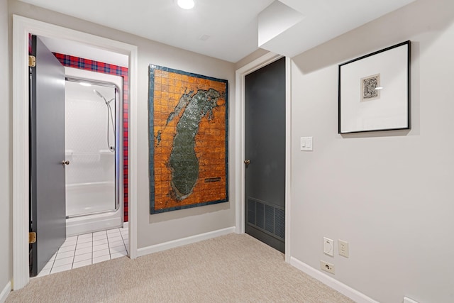 hallway featuring tile patterned flooring, carpet flooring, recessed lighting, and baseboards