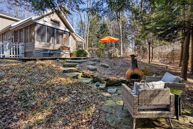 view of yard featuring a sunroom