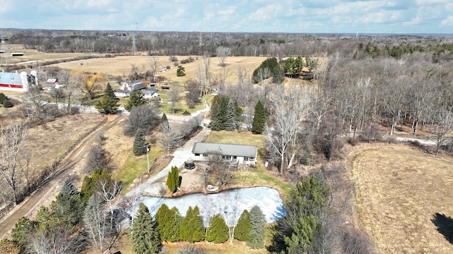 birds eye view of property with a rural view