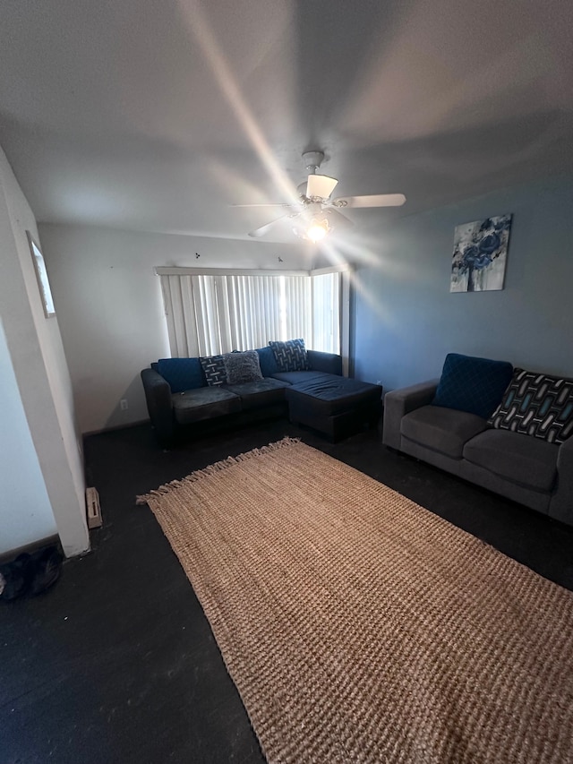 living area with a ceiling fan