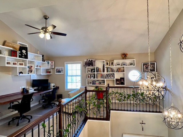 office featuring ceiling fan with notable chandelier and vaulted ceiling