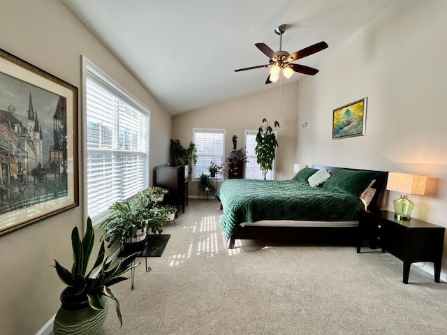 bedroom featuring vaulted ceiling, baseboards, carpet floors, and ceiling fan