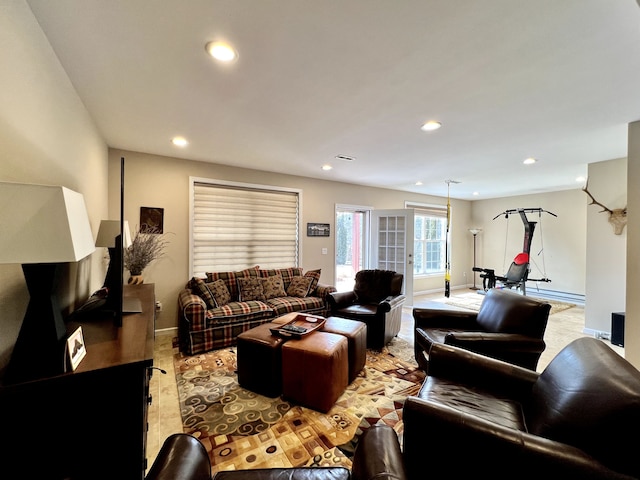 living area featuring visible vents, recessed lighting, and baseboards