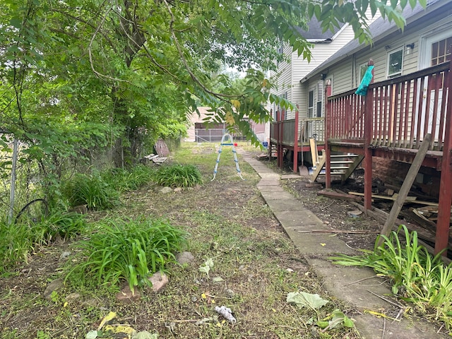 view of yard with a wooden deck