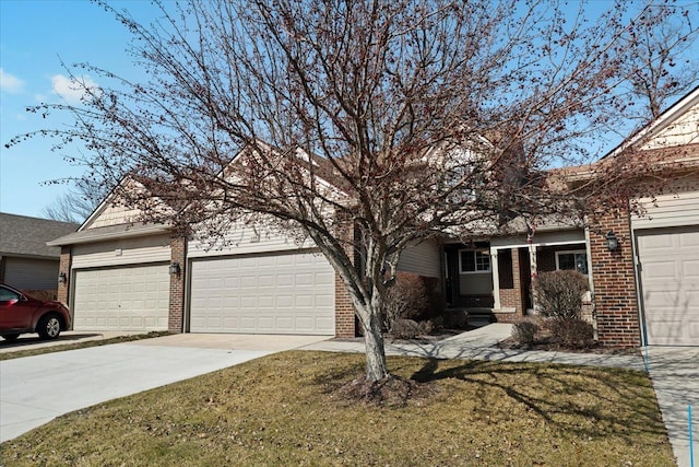 obstructed view of property featuring brick siding, a garage, concrete driveway, and a front yard