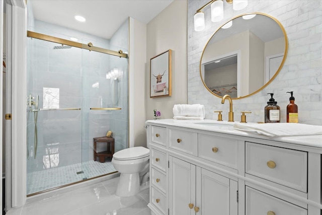 full bathroom with tasteful backsplash, a shower stall, toilet, and vanity