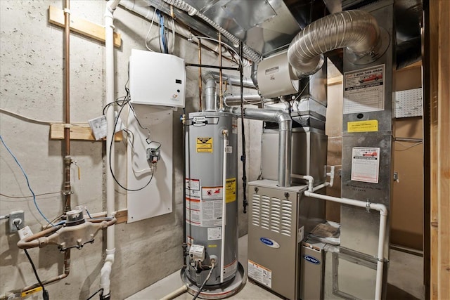 utility room with gas water heater