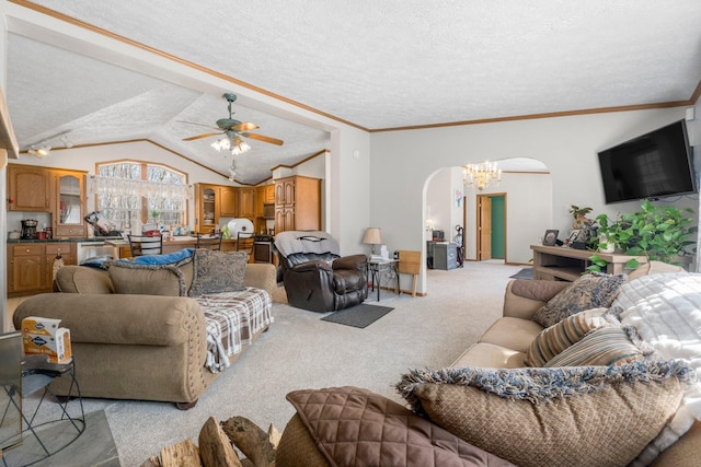 living area featuring lofted ceiling, arched walkways, a textured ceiling, ceiling fan with notable chandelier, and light colored carpet