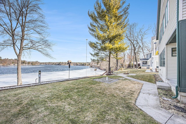 view of yard with a water view