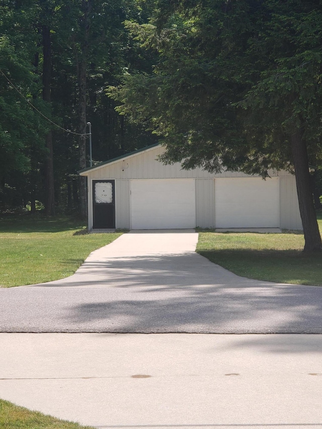 5569 Front St, Newaygo, MI 49337 - detached garage featuring driveway