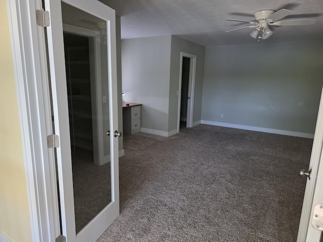 5569 Front St, Newaygo, MI 49337 - empty room featuring a ceiling fan and carpet floors