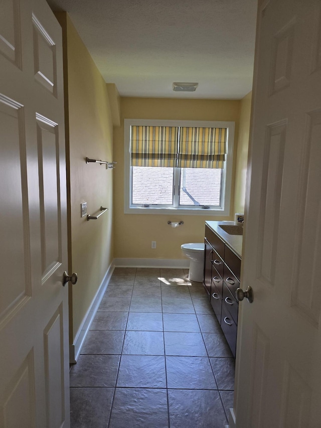 5569 Front St, Newaygo, MI 49337 - bathroom featuring vanity and tile patterned floors