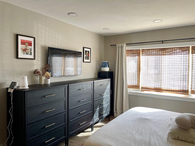 bedroom featuring wood finished floors