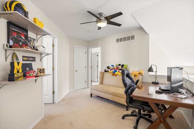 office area with visible vents, ceiling fan, baseboards, and carpet floors