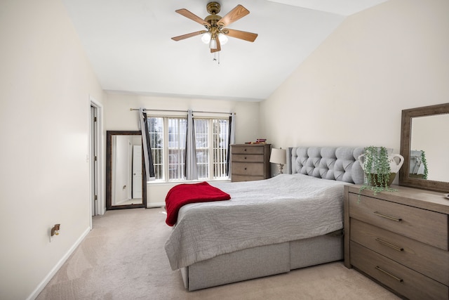 bedroom featuring a ceiling fan, baseboards, carpet floors, and high vaulted ceiling