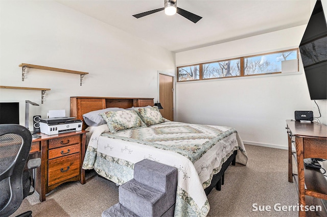 bedroom with baseboards, light colored carpet, and ceiling fan