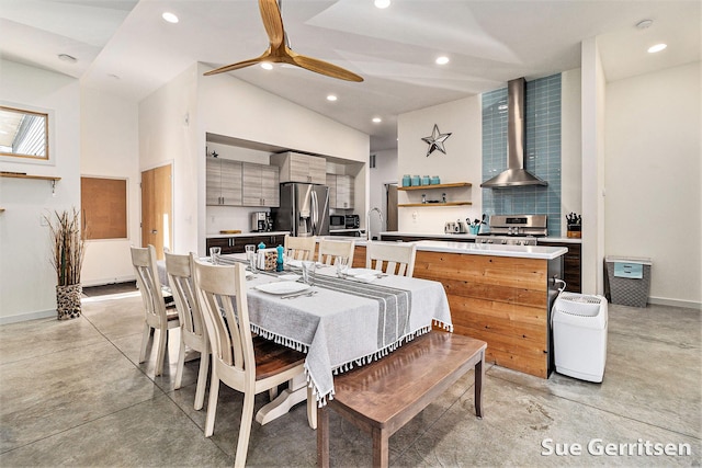 dining area featuring high vaulted ceiling, recessed lighting, concrete floors, baseboards, and ceiling fan