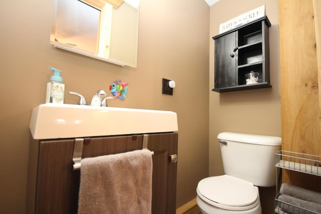 half bath with toilet and vanity