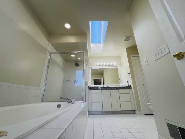 full bathroom with tile patterned floors, a bath, visible vents, and a stall shower