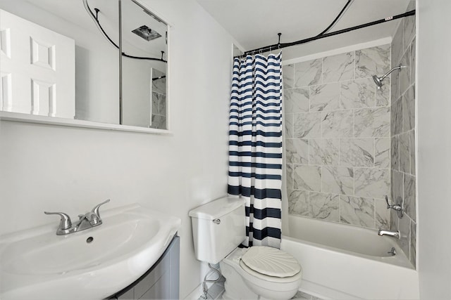 bathroom featuring vanity, toilet, and shower / bath combo