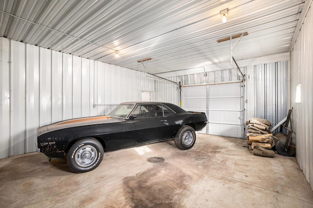 garage featuring metal wall