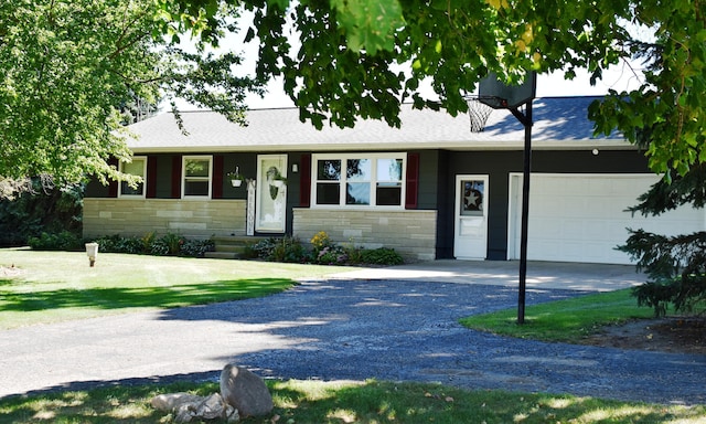 single story home featuring stone siding, an attached garage, a shingled roof, and gravel driveway