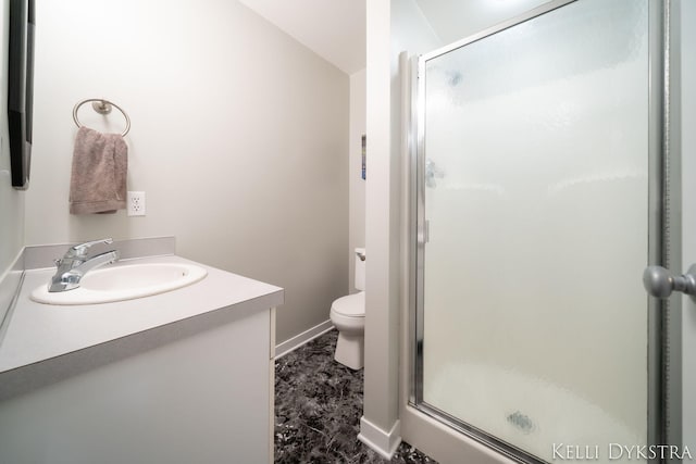 bathroom featuring vanity, baseboards, a shower stall, toilet, and marble finish floor