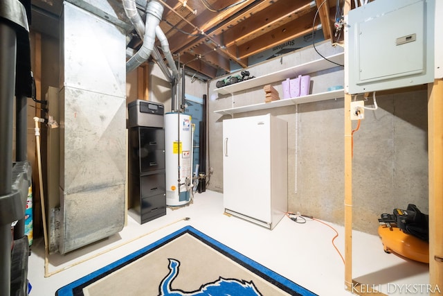 unfinished basement with gas water heater, electric panel, and freestanding refrigerator