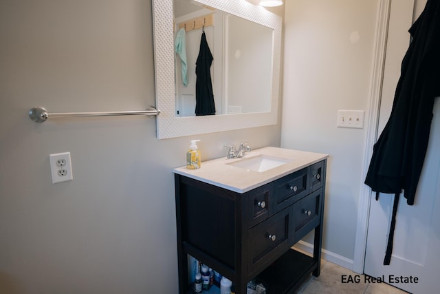 bathroom with vanity and tile patterned floors