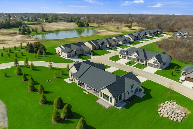 aerial view with a residential view and a water view