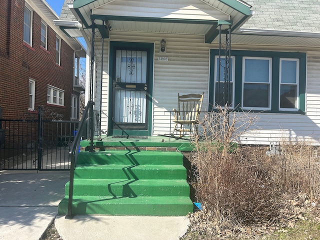 property entrance with fence