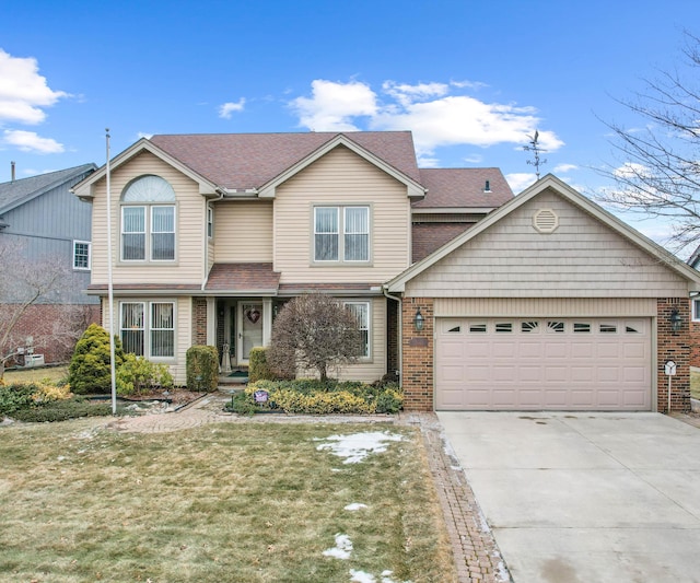 traditional-style home featuring a front lawn, roof with shingles, concrete driveway, a garage, and brick siding