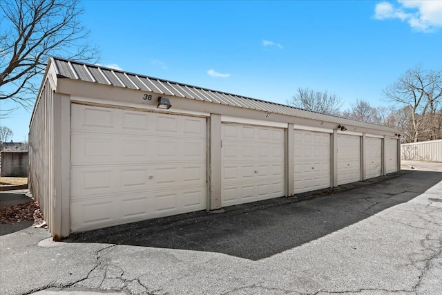 garage featuring fence