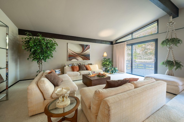 living area with vaulted ceiling with beams and carpet floors