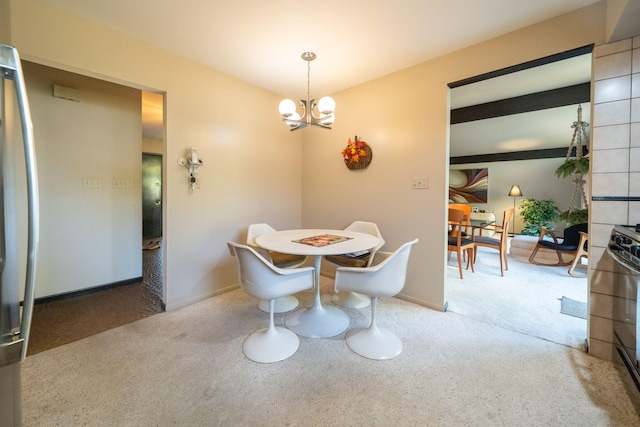 dining space with baseboards, a notable chandelier, and carpet flooring