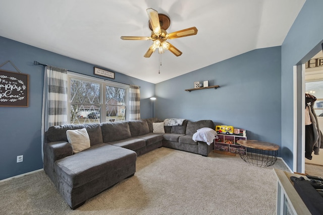 living area featuring carpet flooring, ceiling fan, and lofted ceiling