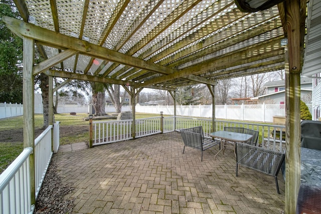 view of patio featuring a fenced backyard, outdoor dining space, and a pergola