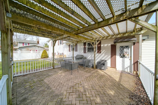 view of patio / terrace featuring fence and a pergola