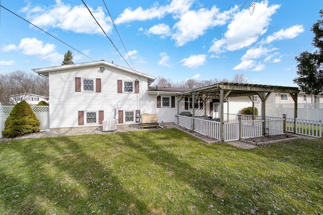 back of property featuring a yard, a patio, a fenced backyard, and a pergola